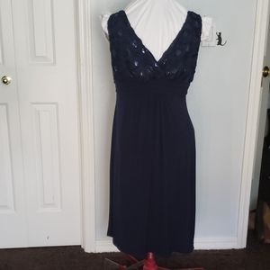 Flattering and fun navy cocktail dress